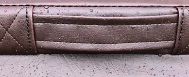 Close-up of a premium heavy-duty handle stitched into the seam of a hot tub cover.