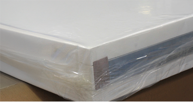 A foam cover core sealed inside a heat-sealed plastic vapor barrier.